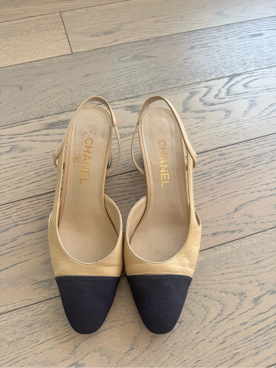 CHANEL Shoes - CHANEL Two-Tone Slingback Pumps in Beige and Black Cap Toe